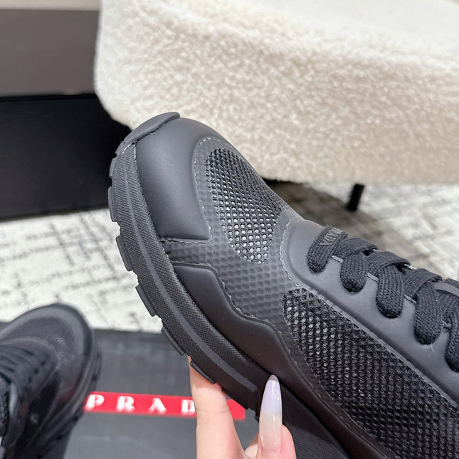 PRADA 25S MEN SNEAKERS IN BLACK CANVAS
