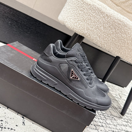 PRADA 25S MEN SNEAKERS IN BLACK CANVAS