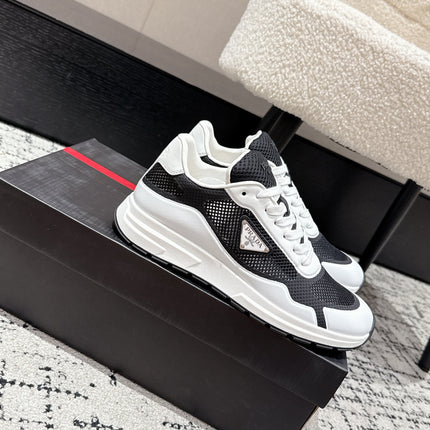 PRADA 25S MEN SNEAKERS IN BLACK AND WHITE CANVAS