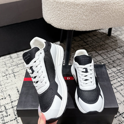 PRADA 25S MEN SNEAKERS IN BLACK AND WHITE CANVAS