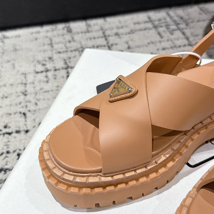 PRADA 25S CRISSCROSS SANDALS IN BURNT ORANGE CALFSKIN LOGO