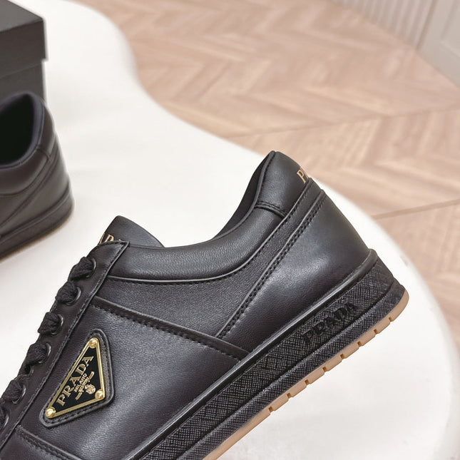 PRADA 25S DOWNTOWN SNEAKERS IN BLACK CALFSKIN
