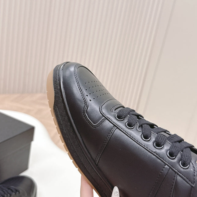 PRADA 25S DOWNTOWN SNEAKERS IN BLACK CALFSKIN