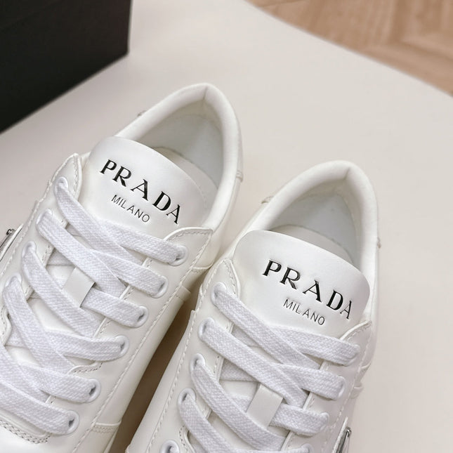 PRADA 25S DOWNTOWN SNEAKERS IN WHITE CALFSKIN SILVER HARDWARE