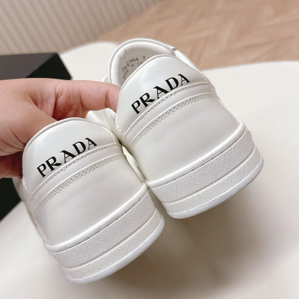 PRADA 25S DOWNTOWN SNEAKERS IN WHITE CALFSKIN SILVER HARDWARE