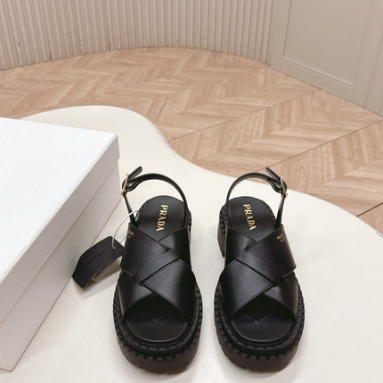 PRADA 25S CRISSCROSS SANDALS IN BLACK CALFSKIN