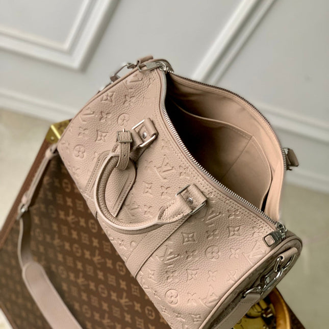 KEEPALL BANDOULIÈRE 34 BAG IN LIGHT BROWN MONOGRAM TAURILLON CALFSKIN