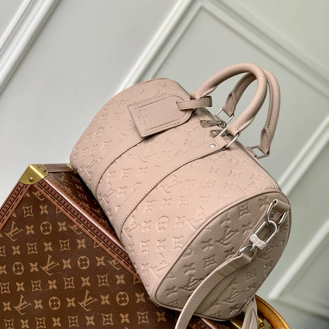 KEEPALL BANDOULIÈRE 34 BAG IN LIGHT BROWN MONOGRAM TAURILLON CALFSKIN