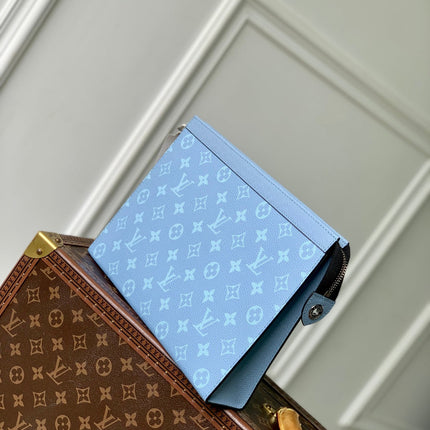 POCHETTE VOYAGE 26 IN LIGHT BLUE MONOGRAM ECLIPSE CALFSKIN