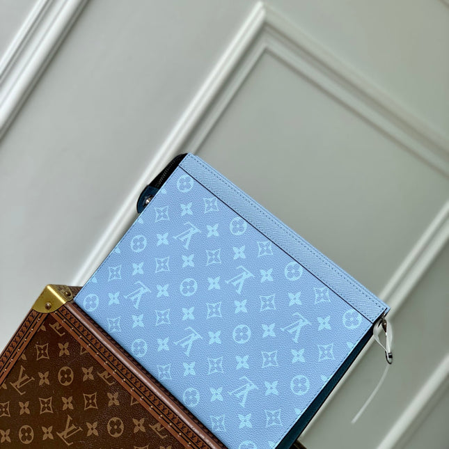 POCHETTE VOYAGE 26 IN LIGHT BLUE MONOGRAM ECLIPSE CALFSKIN