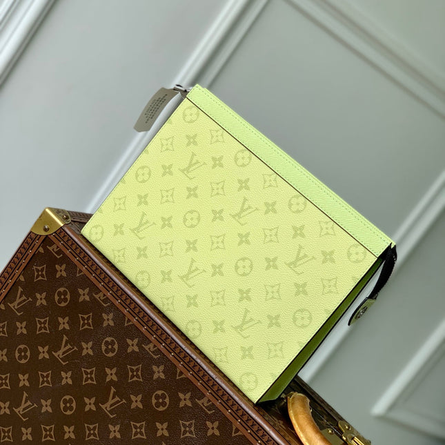 POCHETTE VOYAGE 26 IN LEMON YELLOW MONOGRAM ECLIPSE CALFSKIN