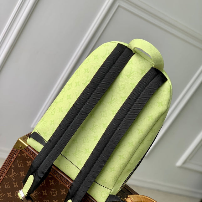 DISCOVERY SLIM BACKPACK 38 IN LEMON YELLOW MONOGRAM ECLIPSE REVERSE CALFSKIN