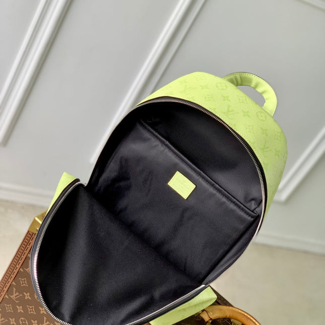 DISCOVERY SLIM BACKPACK 38 IN LEMON YELLOW MONOGRAM ECLIPSE REVERSE CALFSKIN