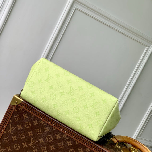 DISCOVERY SLIM BACKPACK 38 IN LEMON YELLOW MONOGRAM ECLIPSE REVERSE CALFSKIN