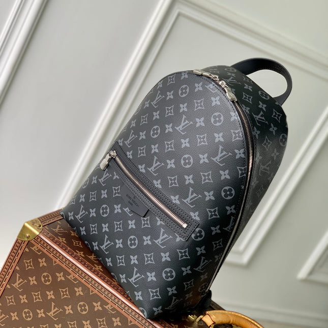 DISCOVERY SLIM BACKPACK 38 IN BLACK MONOGRAM ECLIPSE COATED CALFSKIN