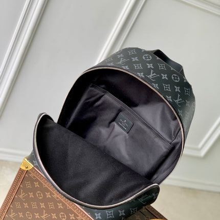 DISCOVERY SLIM BACKPACK 38 IN BLACK MONOGRAM ECLIPSE COATED CALFSKIN