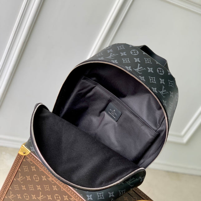 DISCOVERY SLIM BACKPACK 38 IN BLACK MONOGRAM ECLIPSE COATED CALFSKIN