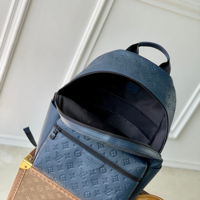 DISCOVERY PM BACKPACK 38 IN NAVY BLUE LAMBSKIN EMBOSSED MONOGRAM LOGO