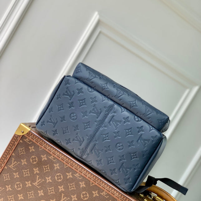 DISCOVERY PM BACKPACK 38 IN NAVY BLUE LAMBSKIN EMBOSSED MONOGRAM LOGO