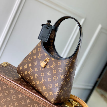 THE DROP PM 28 IN BROWN MONOGRAM COATED CANVAS AND CALFSKIN