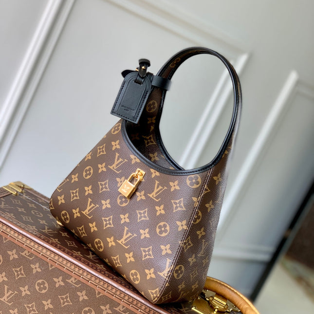 THE DROP PM 28 IN BROWN MONOGRAM COATED CANVAS AND CALFSKIN