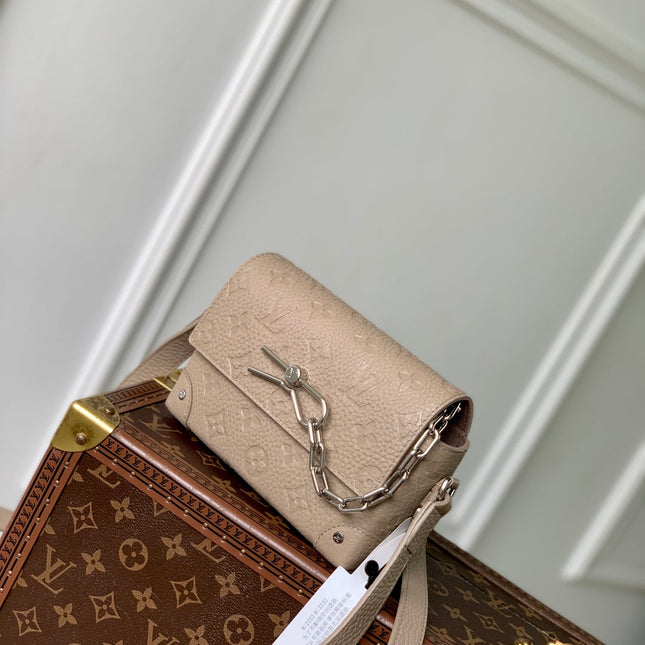 STEAMER WEARABLE WALLET 18 IN LIGHT BROWN MONOGRAM TAURILLON CALFSKIN