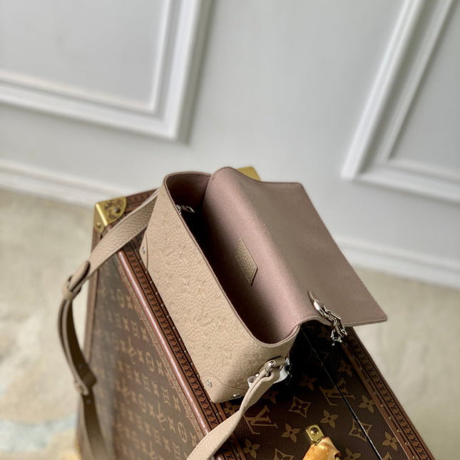 STEAMER WEARABLE WALLET 18 IN LIGHT BROWN MONOGRAM TAURILLON CALFSKIN
