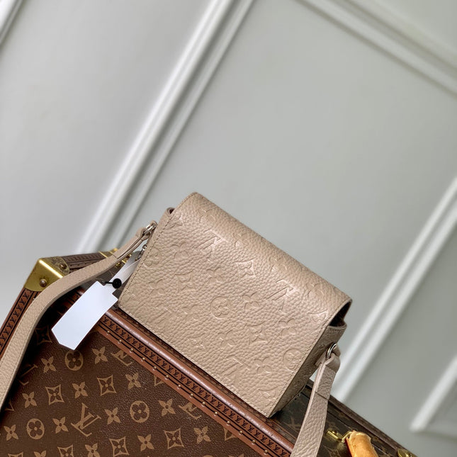 STEAMER WEARABLE WALLET 18 IN LIGHT BROWN MONOGRAM TAURILLON CALFSKIN