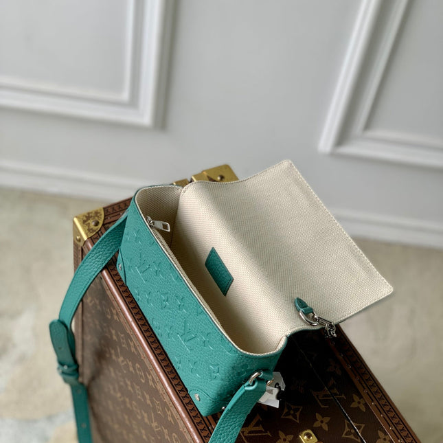 STEAMER WEARABLE WALLET 18 IN TEAL GREEN MONOGRAM TAURILLON CALFSKIN