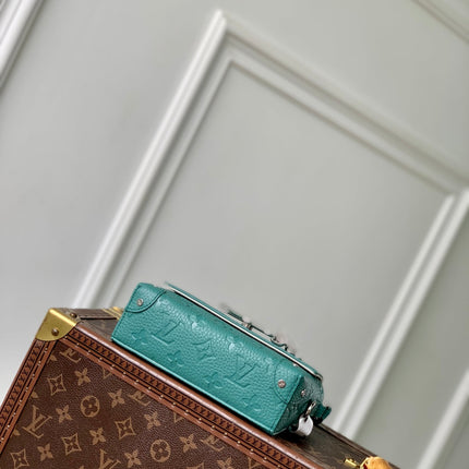 STEAMER WEARABLE WALLET 18 IN TEAL GREEN MONOGRAM TAURILLON CALFSKIN