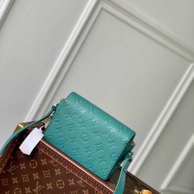 STEAMER WEARABLE WALLET 18 IN TEAL GREEN MONOGRAM TAURILLON CALFSKIN