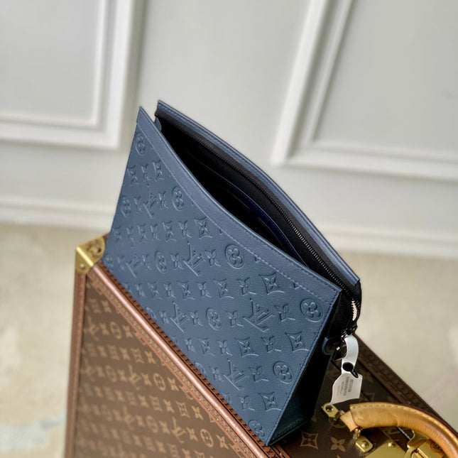 POCHETTE VOYAGE 27 IN DARK BLUE MONOGRAM ECLIPSE CALFSKIN EMBOSSED LOGO
