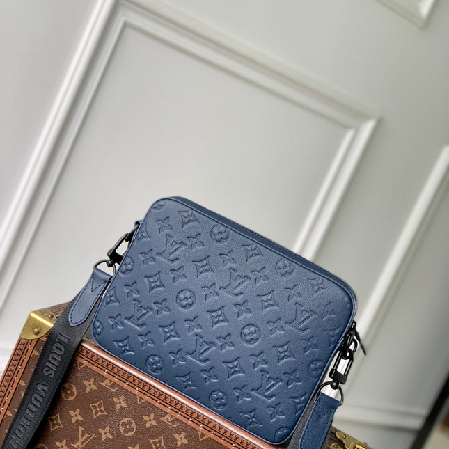 TRIO MESSENGER 25 IN BLUE MONOGRAM SHADOW CALFSKIN