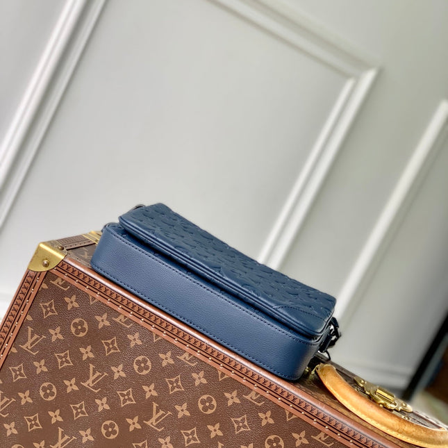 TRIO MESSENGER 25 IN BLUE MONOGRAM SHADOW CALFSKIN