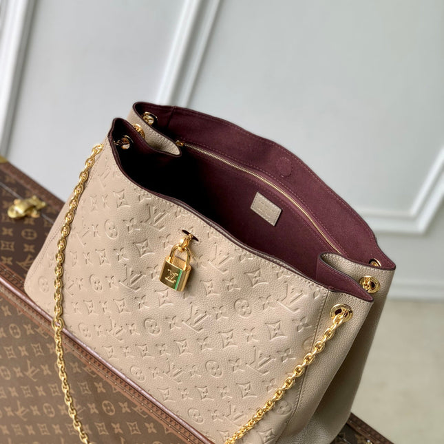 ANYTIME MM 42 IN TOURTERELLE GRAY MONOGRAM EMPREINTE CALFSKIN GOLD HARDWARE