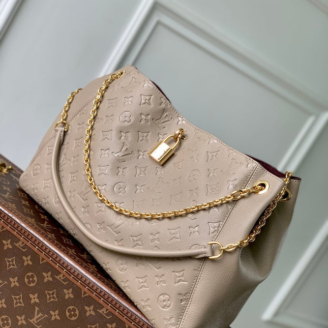 ANYTIME MM 42 IN TOURTERELLE GRAY MONOGRAM EMPREINTE CALFSKIN GOLD HARDWARE