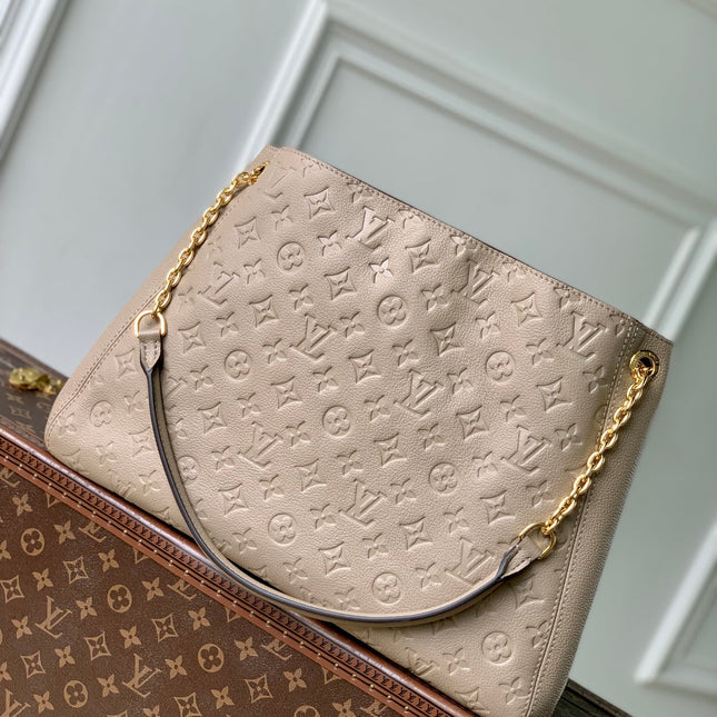ANYTIME MM 42 IN TOURTERELLE GRAY MONOGRAM EMPREINTE CALFSKIN GOLD HARDWARE