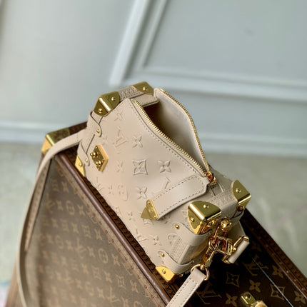 SIDE TRUNK 19 IN BEIGE MONOGRAM BOLD CALFSKIN GOLD HARDWARE