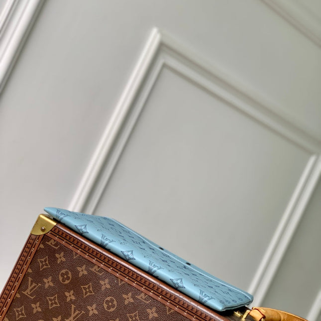 POCHETTE TO GO 30 IN SKY BLUE MONOGRAM SHADOW CALFSKIN EMBOSSED LOGO