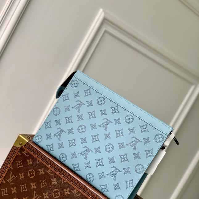 POCHETTE VOYAGE 26 IN SKY BLUE MONOGRAM ECLIPSE CALFSKIN