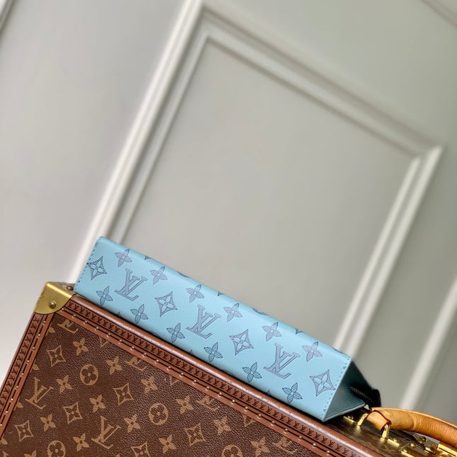 POCHETTE VOYAGE 26 IN SKY BLUE MONOGRAM ECLIPSE CALFSKIN