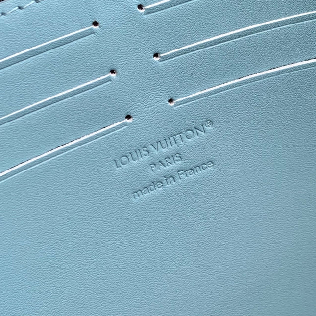 POCHETTE VOYAGE 26 IN SKY BLUE MONOGRAM ECLIPSE CALFSKIN