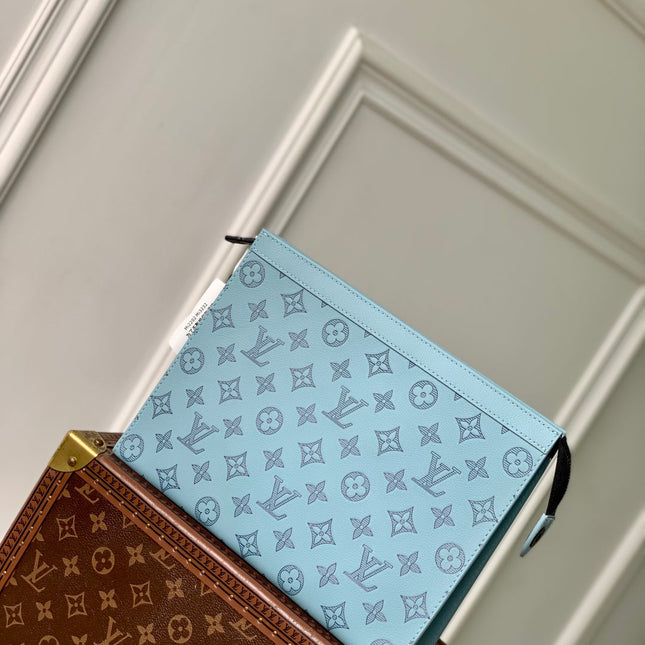 POCHETTE VOYAGE 26 IN SKY BLUE MONOGRAM ECLIPSE CALFSKIN