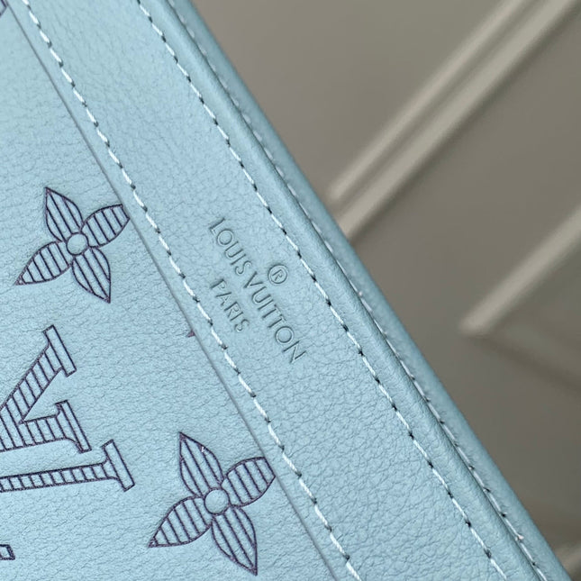 GASTON WEARABLE WALLET 22 IN SKY BLUE MONOGRAM SHADOW CALFSKIN EMBOSSED LOGO