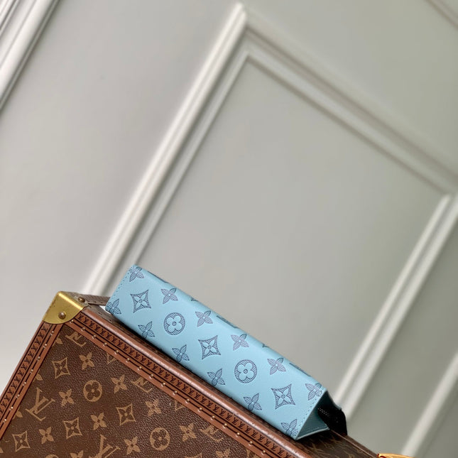 GASTON WEARABLE WALLET 22 IN SKY BLUE MONOGRAM SHADOW CALFSKIN EMBOSSED LOGO