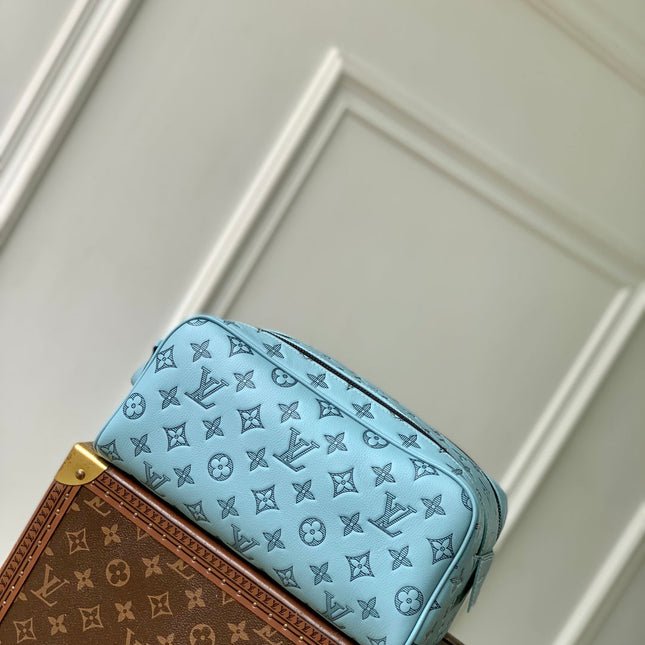 DOPP KIT 28 IN SKY BLUE MONOGRAM SHADOW CALFSKIN EMBOSSED LOGO