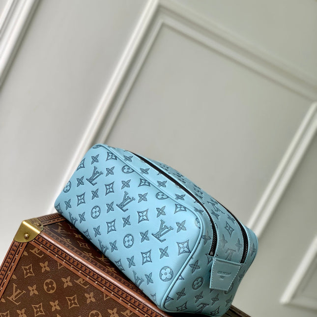 DOPP KIT 28 IN SKY BLUE MONOGRAM SHADOW CALFSKIN EMBOSSED LOGO