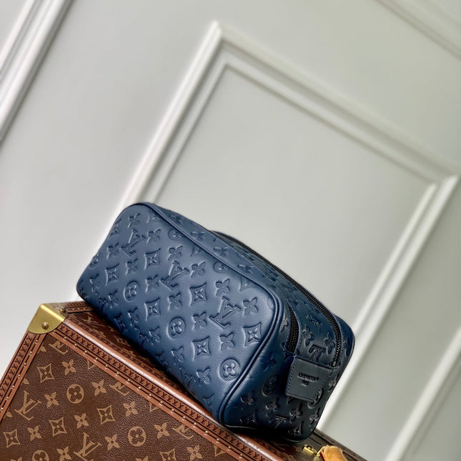 DOPP KIT 28 IN DARK BLUE MONOGRAM SHADOW CALFSKIN