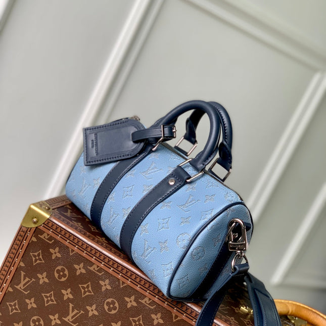 KEEPALL BANDOULIÈRE 25 INSKY BLUE MONOGRAM HERITAGE CANVAS DARK BLUE CALFSKIN