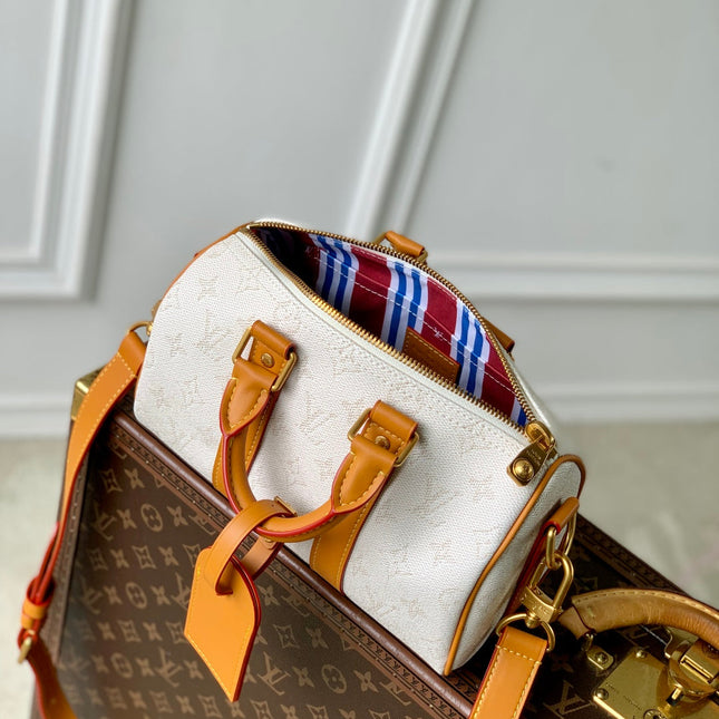 KEEPALL BANDOULIÈRE 25 IN WHITE MONOGRAM HERITAGE CANVAS BRWON CALFSKIN